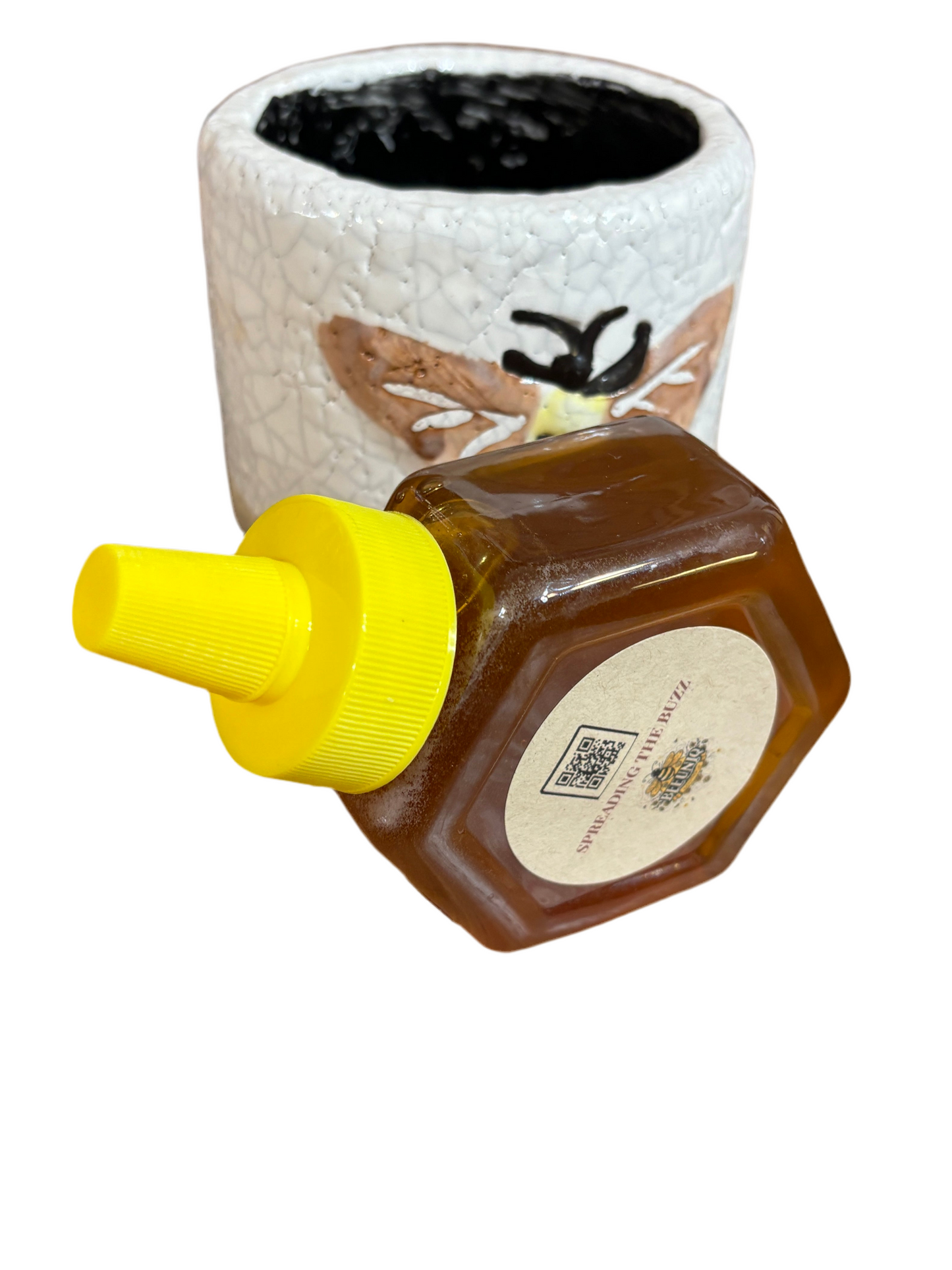 Hexagon shape bottle of honey.