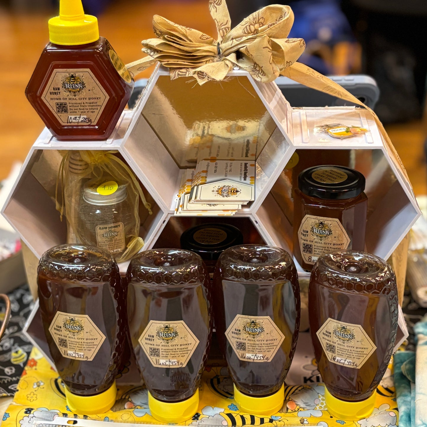 A display of variety o sizes of honey.