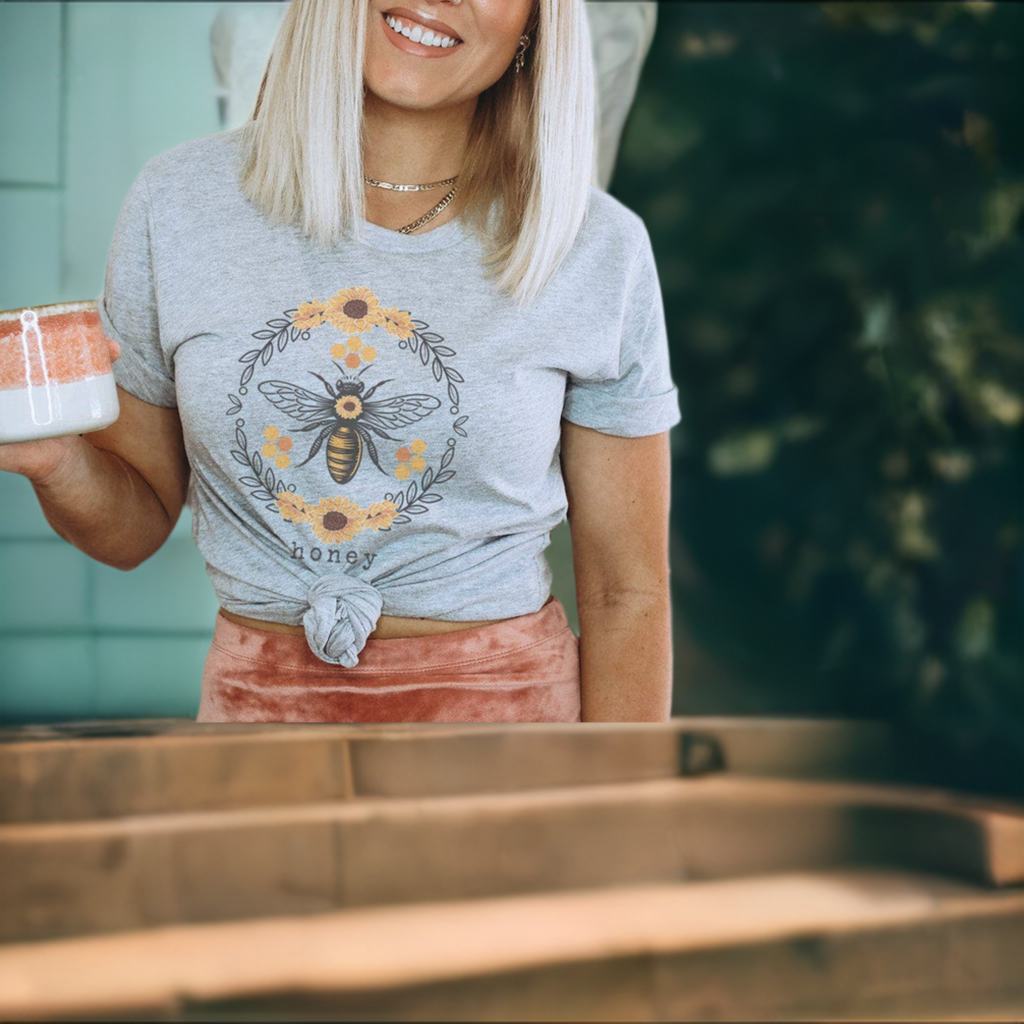 Lightweight gray bee tee shirt with the word honey.