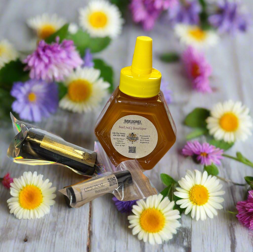 Gift box with honey, lip balm, and a stick of salve.