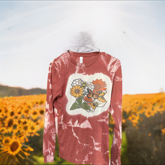 Long sleeve copper and white pollinator tee shirt.