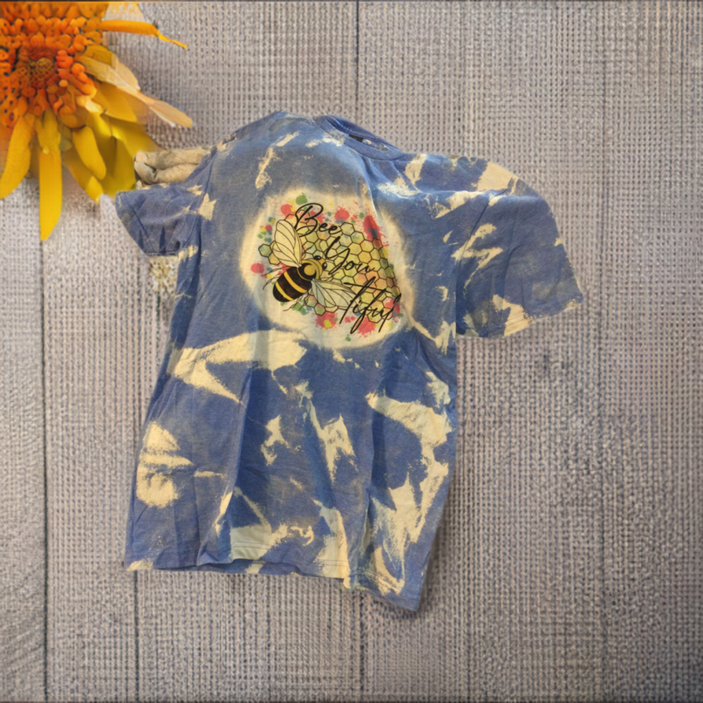Blue and white Pollinator Tee shirt with colors of pollen hexagon and bee tee shirt